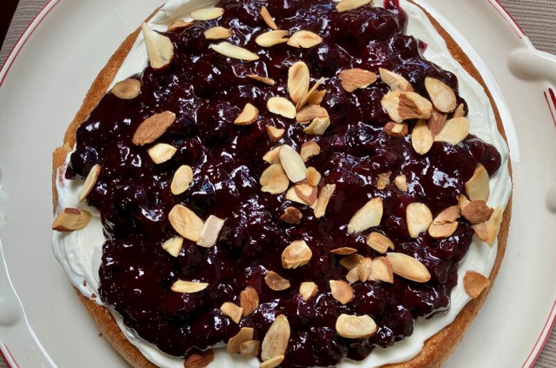 Lemon almond cake with blueberry sumac compote Lemon almond cake with blueberry sumac compote and toasted almonds on top